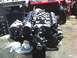 1991 Ford Mustang - Engine assembly, likely a V8, with an alternator and intake manifold visible. The registry claims it is a 1991 Ford Mustang, but this is un…