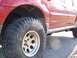 2002 Ford Sport Trac - This 2002 Ford Sport Trac features prominent Explorer badging and is equipped with large off-road tires, suggesting off-road capability.