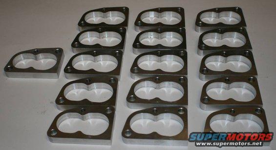 Multiple aluminum throttle body spacers arranged in rows