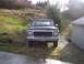 1978 Ford Bronco - This Ford truck has a prominent grille and a license plate reading RLT-111.