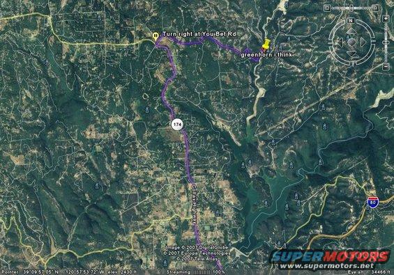 Satellite map showing a route overlay with text labels and road markers