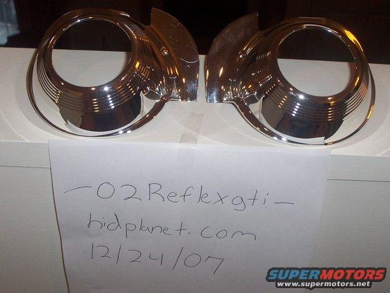 Pair of chrome headlight bezels with ribbed detailing