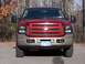 2005 Ford Excursion - Front view of a 2005 Ford Excursion, showing its distinctive grille and headlights.