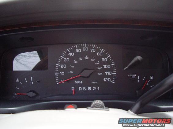 Car's dashboard with speedometer, fuel gauge, and gear selector