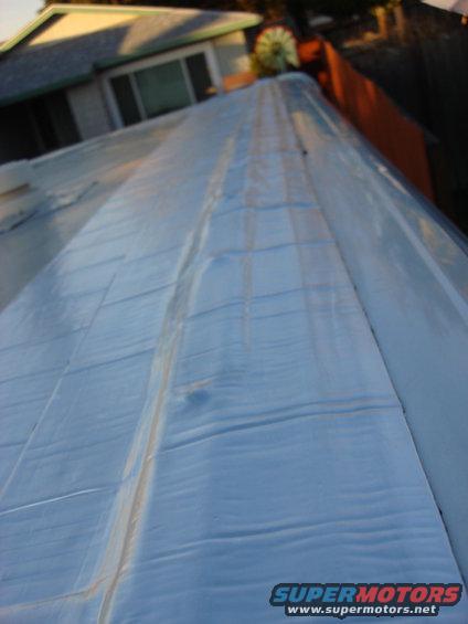 roof-patch-rear_8.jpg the next row sealed 1/2 on the 1st line of roof seal i put down and completly covered the old seal onto new fiberglass of the end cap. i then over rolled this as well total time was 45 min. we now had 6 rains and it looks great and feel stuck the whole way. it turned out real good.