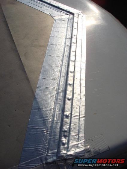 front-roof-patch_2.jpg you can see i overlapped the old seal and rolled it in good and tight
