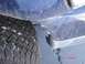 1981 Ford Bronco - Close-up of a blue vehicle's fender and tire, with snow visible on the tire tread. A timestamp indicates 11:11 AM.