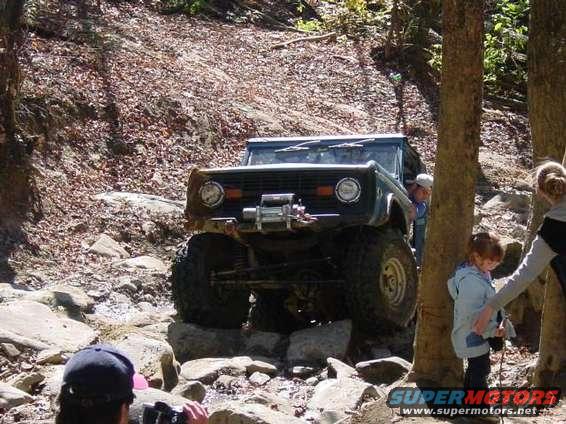 1976 Ford Bronco on rocky trail with winch