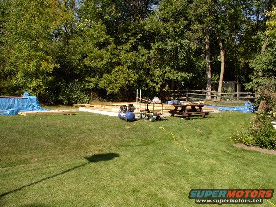 img_0215.jpg Three walls built and laid down on the slab ready to erect. Rear and both sides. We'll stick build the front, main door wall.