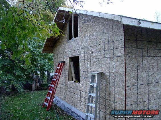 img_0324.jpg Rear window shot. Sheathing continues.