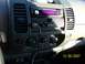 2007 Nissan Xterra - Dashboard of a 2007 Nissan Xterra, a Kenwood stereo and a CB radio.