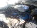 1992 Ford Bronco - Close-up view of a vehicle's engine bay, showing various components and wiring.
