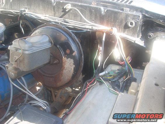 Brake booster and master cylinder assembly with wiring harness