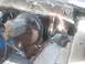 1992 Ford Bronco - Close-up view of the brake booster and master cylinder assembly in an engine bay.