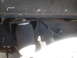 1992 Ford Bronco - Vehicle frame with an air suspension component visible.