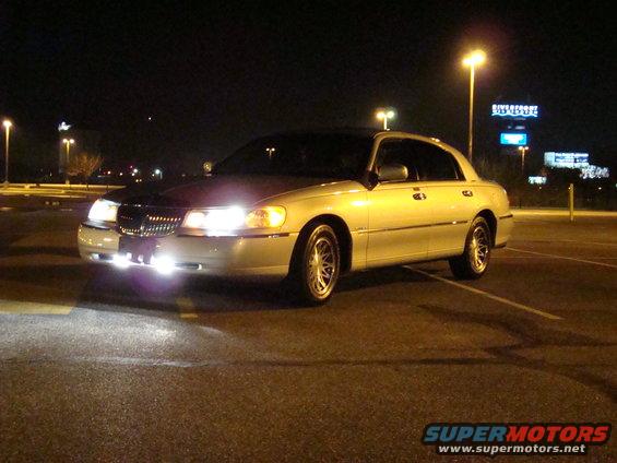 2002 Lincoln Town Car parked at night