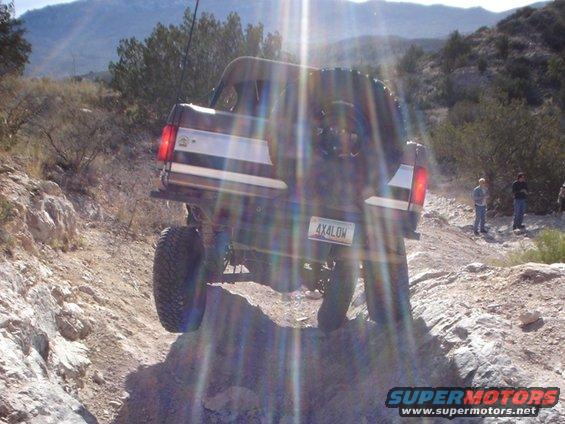 1989 Ford Bronco rear view on rocky terrain