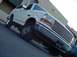 1992 Ford Bronco - This 1992 Ford Bronco features a distinctive chrome grille and a 3/4 front view.