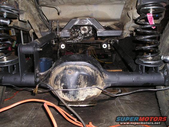 Rear axle and suspension components with custom linkage