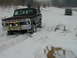 1979 Ford Bronco - A 1978 Ford Bronco navigates a snowy path with another vehicle following behind.
