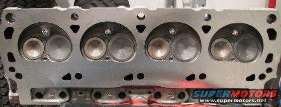 Engine cylinder head with four valves visible