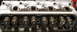 1980 Ford Bronco - This is a close-up view of an engine's cylinder head, showing the spark plug holes and valve train components.