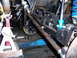 1980 Ford Bronco - Undercarriage view shows suspension components and differential housing, likely during a repair or upgrade.