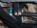 1980 Ford Bronco - Aftermarket suspension parts are visible in this close-up view of a vehicle's undercarriage.