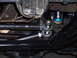1980 Ford Bronco - Undercarriage view shows the steering system and suspension components of a vehicle.