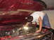 Me pulling the old spark plug wires.