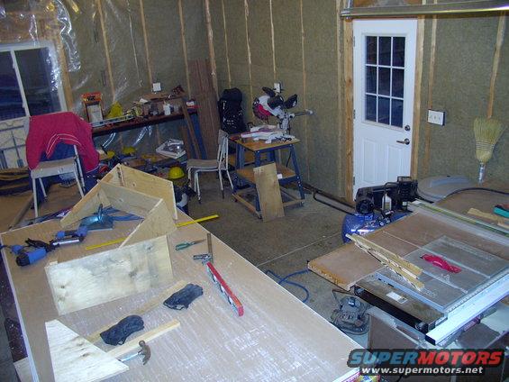 img_0309.jpg R-22 Roxul insulation done, poly barrier started.