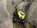 1996 Ford Bronco - A remote control rock crawler toy is shown navigating a rocky terrain.