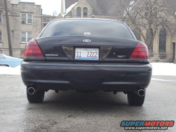 Rear view of a black 2000 Ford Crown Victoria with Illinois plates