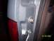 1996 Ford Bronco - Close-up of a vehicle's tailgate latch mechanism, with a date stamp visible in the corner.