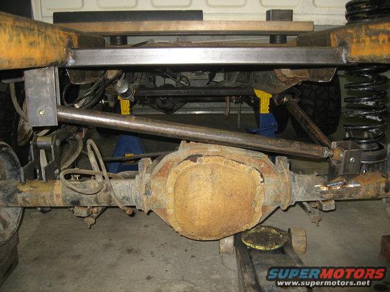 Rear axle and suspension components of a truck under modification
