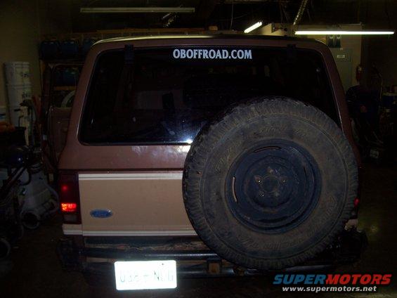 1984 Ford Bronco II rear view with spare tire mounted externally, OBoffroad.com sticker on window