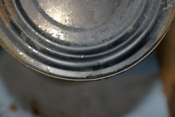 Worn metal rim with concentric rings