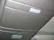 1994 Chevrolet Silverado 3500 - Close-up of a vehicle's interior overhead console, showing the dome light and storage compartment.