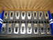 1979 Ford F-150 - A new set of performance engine rocker arms and hardware are neatly arranged in a cardboard box.