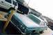 1973 Mercury Monterey - A light blue sedan with a prominent grille and dual headlights is parked in a lot with other vehicles.