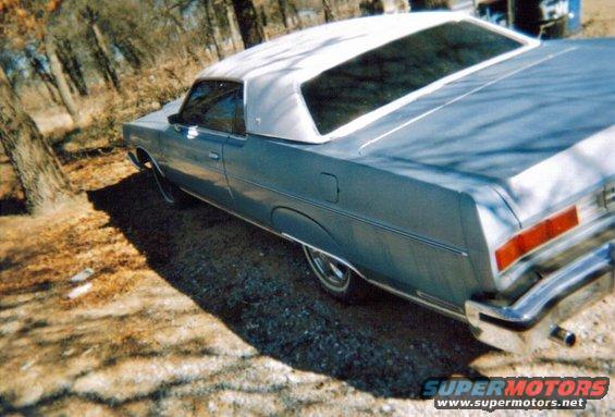 1973 Mercury Monterey coupe, blue with white vinyl roof, rear three-quarter view