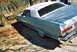 1973 Mercury Monterey - This 1973 Mercury Monterey coupe features a distinctive blue exterior complemented by a white vinyl roof, seen from the rear three-quarter…
