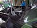 1970 Ford Ranchero - The engine compartment of a car is shown with the hood removed, revealing the engine and surrounding components.