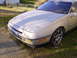 1989 Ford Probe - This car has a distinctive body style with pop-up headlights and a profile.