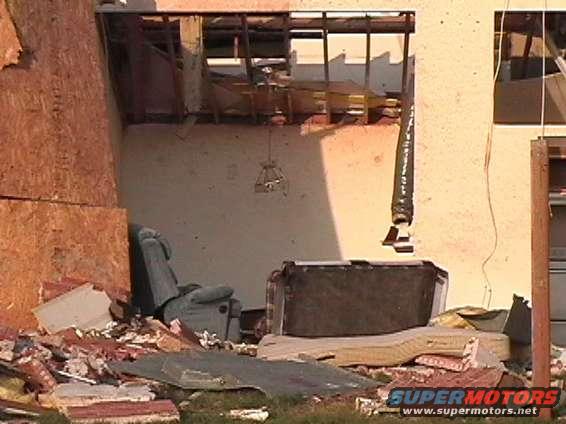tornado_living_room.jpg next street over, what is left of there living room