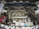 1993 Ford Taurus - Engine bay of a car, showing the V6 engine and various components.