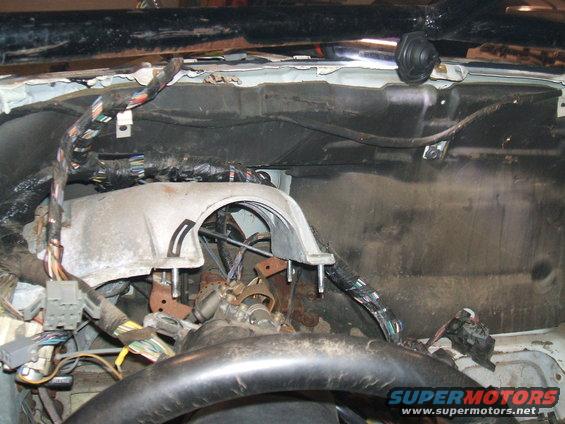 Dashboard wiring harness and steering column components of a disassembled vehicle