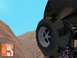1988 Ford Bronco - A digital rendering shows a close-up of a vehicle's tire and wheel in a desert-like environment.