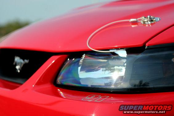 2004 Saleen S-281SC front grille with running horse emblem and headlight
