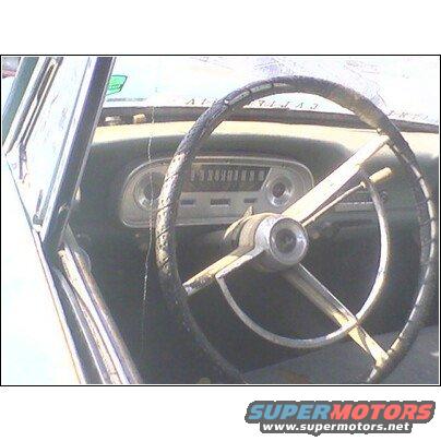 1972 Ford Ranchero interior with cracked steering wheel and dashboard gauges